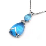 Weissgoldenes Blautopas Collier mit Diamanten