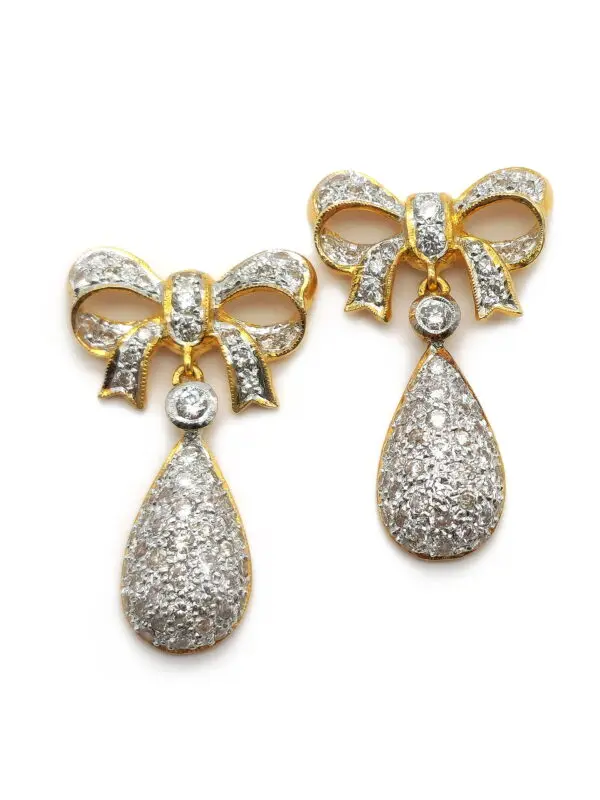 Bicolor Ohrstecker Schleife mit Diamanten