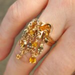 Edelstein Damenring baumelnd aus 585er Rosegold