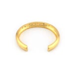 Designer Armreif aus 750er Gold mit Saphiren