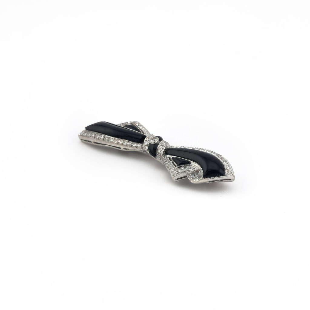 Schleifenbrosche aus 750er Gold, Diamanten und Onyx (2)